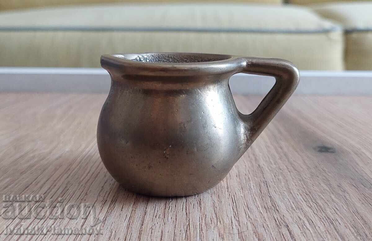 Auction  Brass jug for collectors