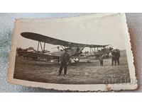 Photo Two Bulgarian biplanes on a grass runway