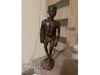 The Bushman from The Gods must have gone crazy, statuette!