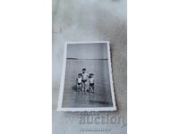 Photo Three boys on the beach