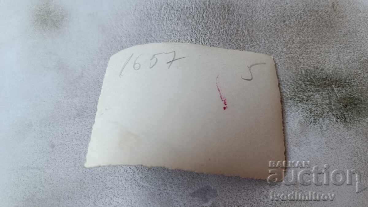 Photo Young girl sitting on a stone wall with price 1.65 BGN | € 0.84 Photo Young girl sitting on a stone wall with price 1.65 BGN | € 0.84