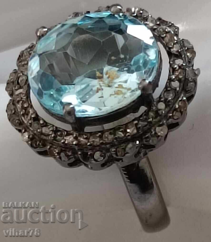 silver ring with aquamarine and surrounded by a scale of diamonds with price 199.99 BGN | € 102.25