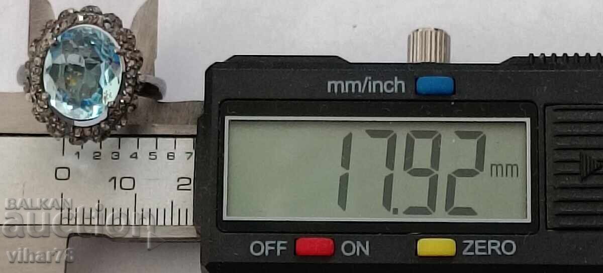 Delivery of silver ring with aquamarine and surrounded by a scale of diamonds