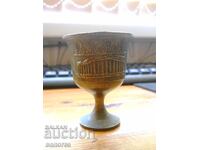 A bronze cup with an image of the Acropolis