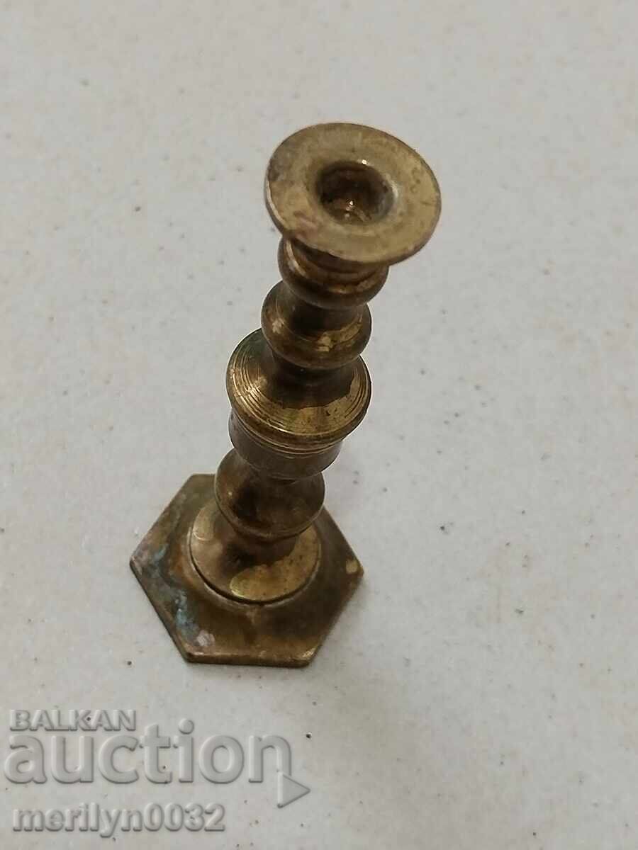 Delivery of Old bronze candlestick minion candle Delivery of Old bronze candlestick minion candle