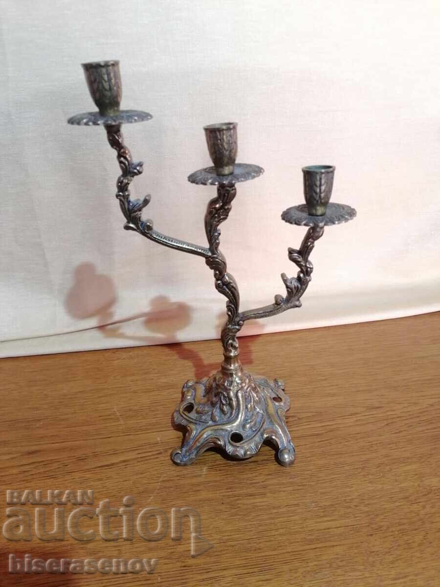 A beautiful massive bronze candle holder