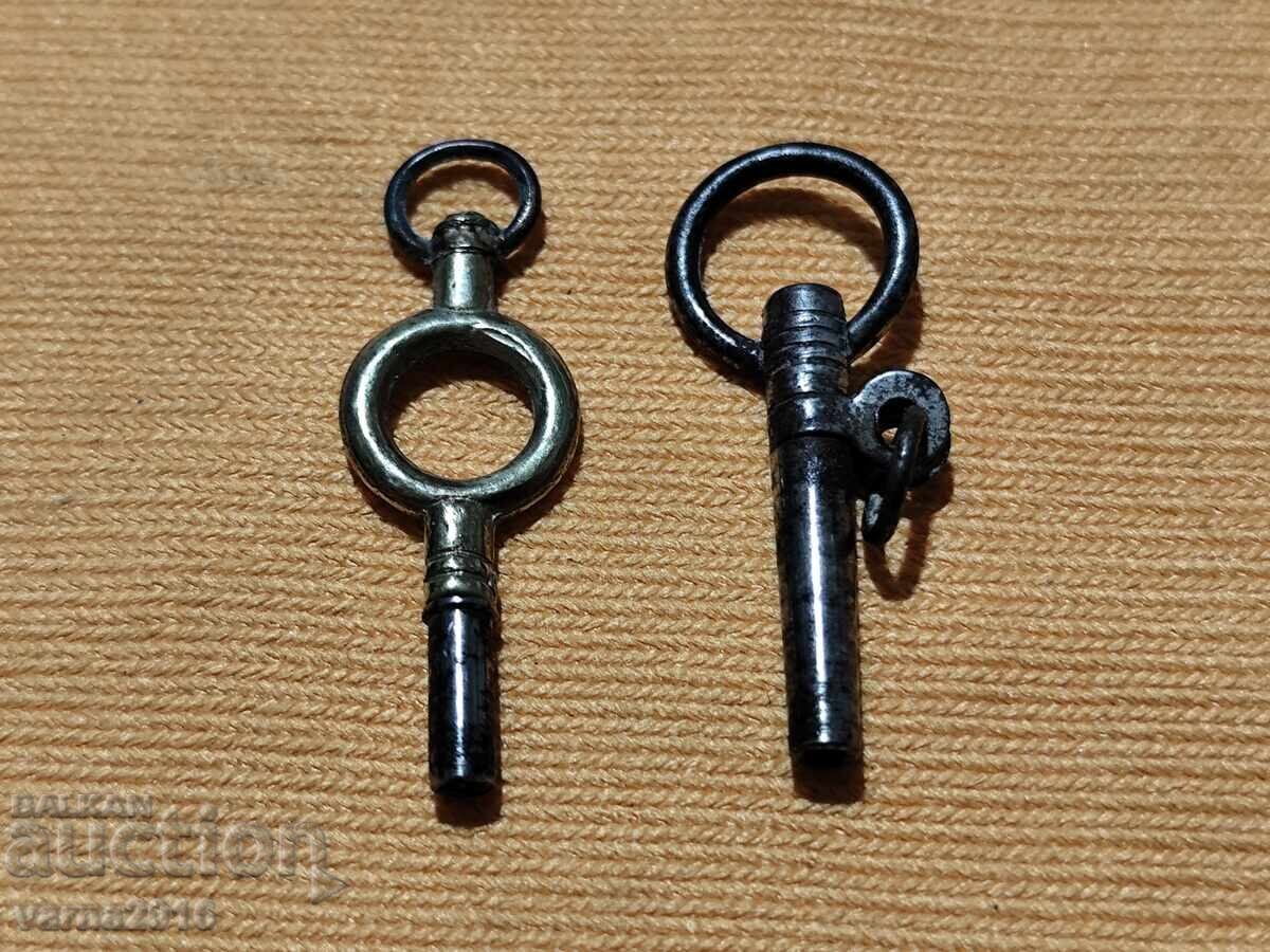 LOT DE DOUĂ CHEI CEAS DE BUZUUNAR LOT DE DOUĂ CHEI CEAS DE BUZUUNAR