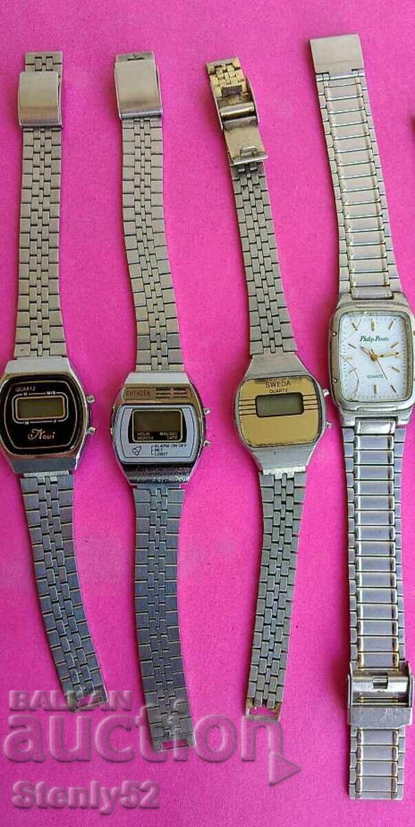 Old electronic watches with metal chains. Old electronic watches with metal chains.