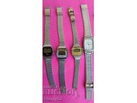 Παλιά ηλεκτρονικά ρολόγια με μεταλλικές αλυσίδες.