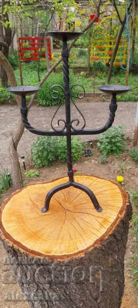 Old forged candle holder