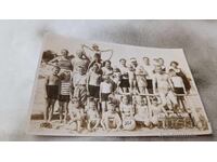 Photo Men, women and children on the beach 1938