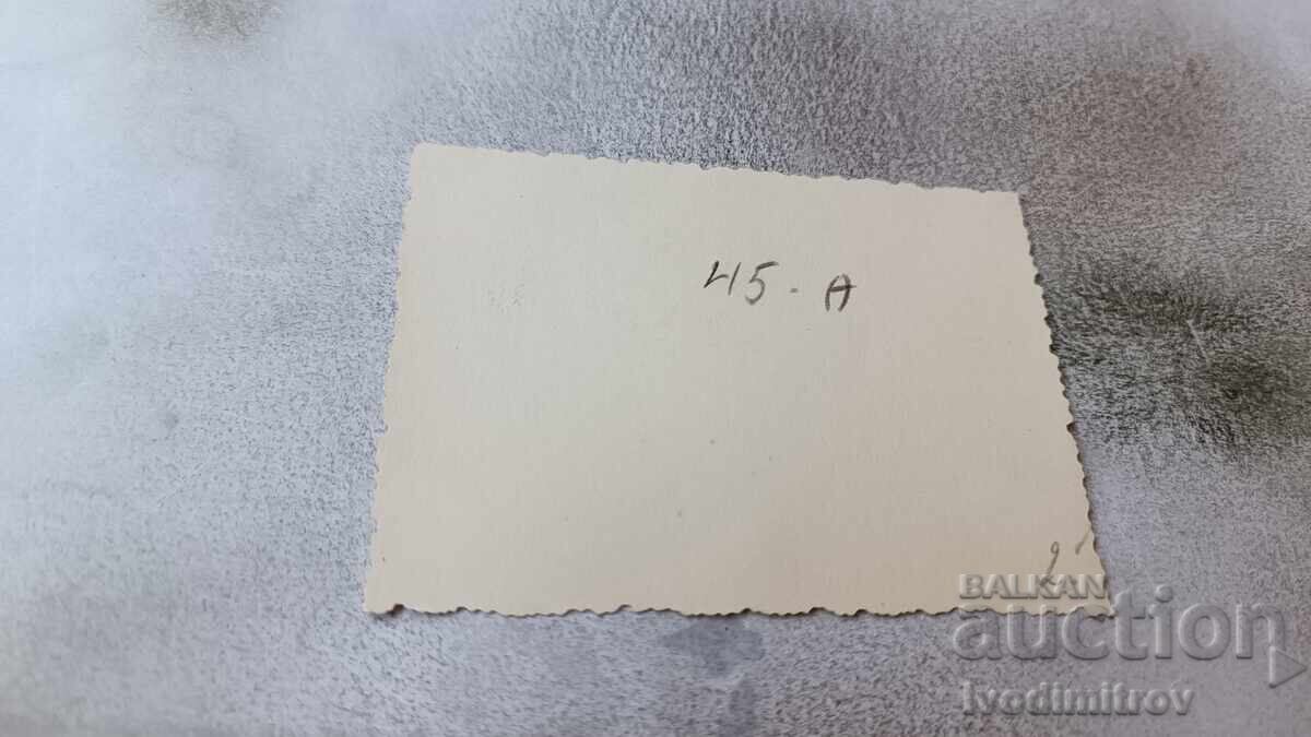 Photo Young woman on stones by the sea with price 1.45 BGN | € 0.74 Photo Young woman on stones by the sea with price 1.45 BGN | € 0.74