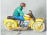 Old Russian metal mechanical toy model motorbike biker