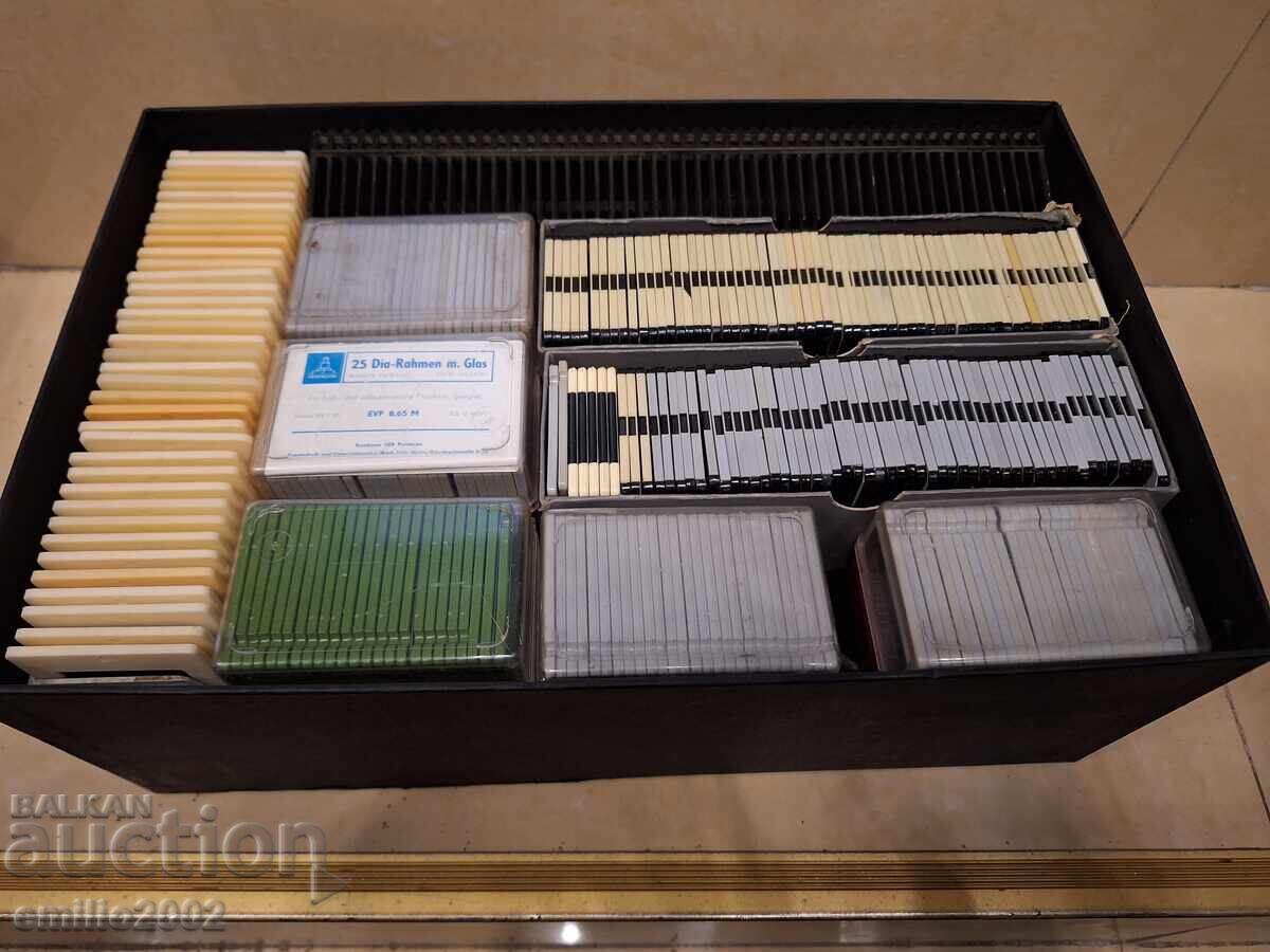 Delivery of Large number of slides and 2 cassettes Delivery of Large number of slides and 2 cassettes