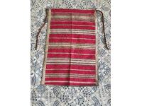 Richly embroidered gingham apron from a folk costume