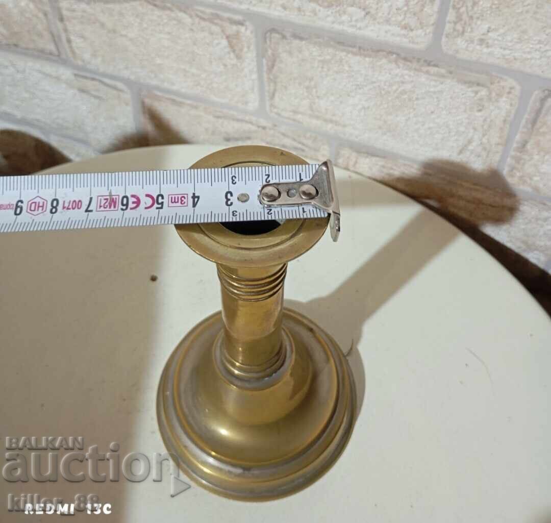 Auction  Bronze candlestick