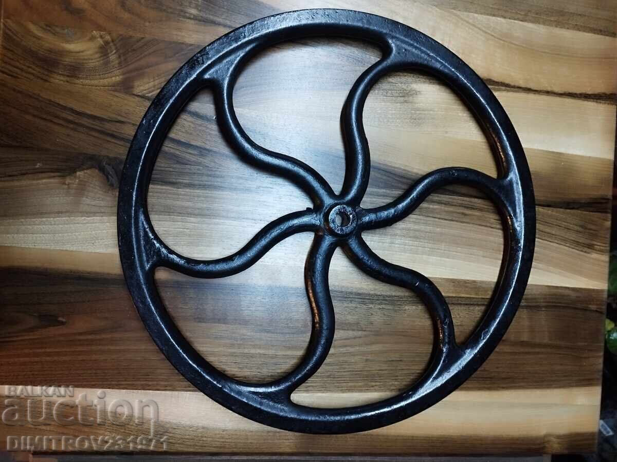 Cast iron sewing machine wheel. Cast iron sewing machine wheel.