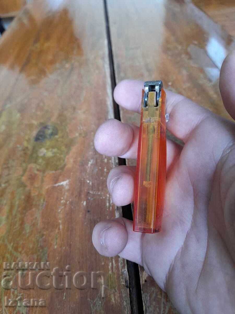 Auction  Old Sim lighter