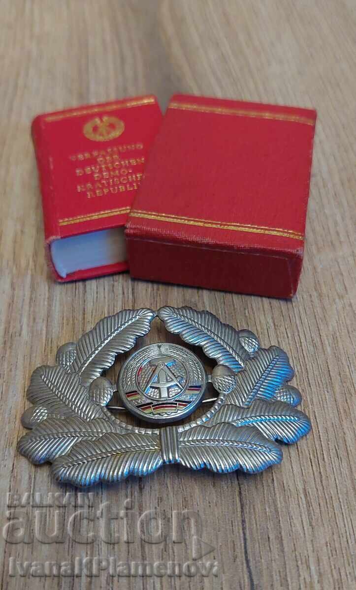 GDR cockade and booklet for collectors with price 20.00 BGN | € 10.23