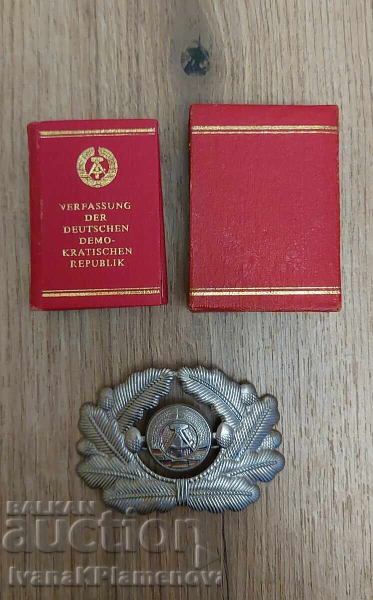Auction  GDR cockade and booklet for collectors