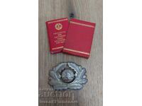 GDR cockade and booklet for collectors