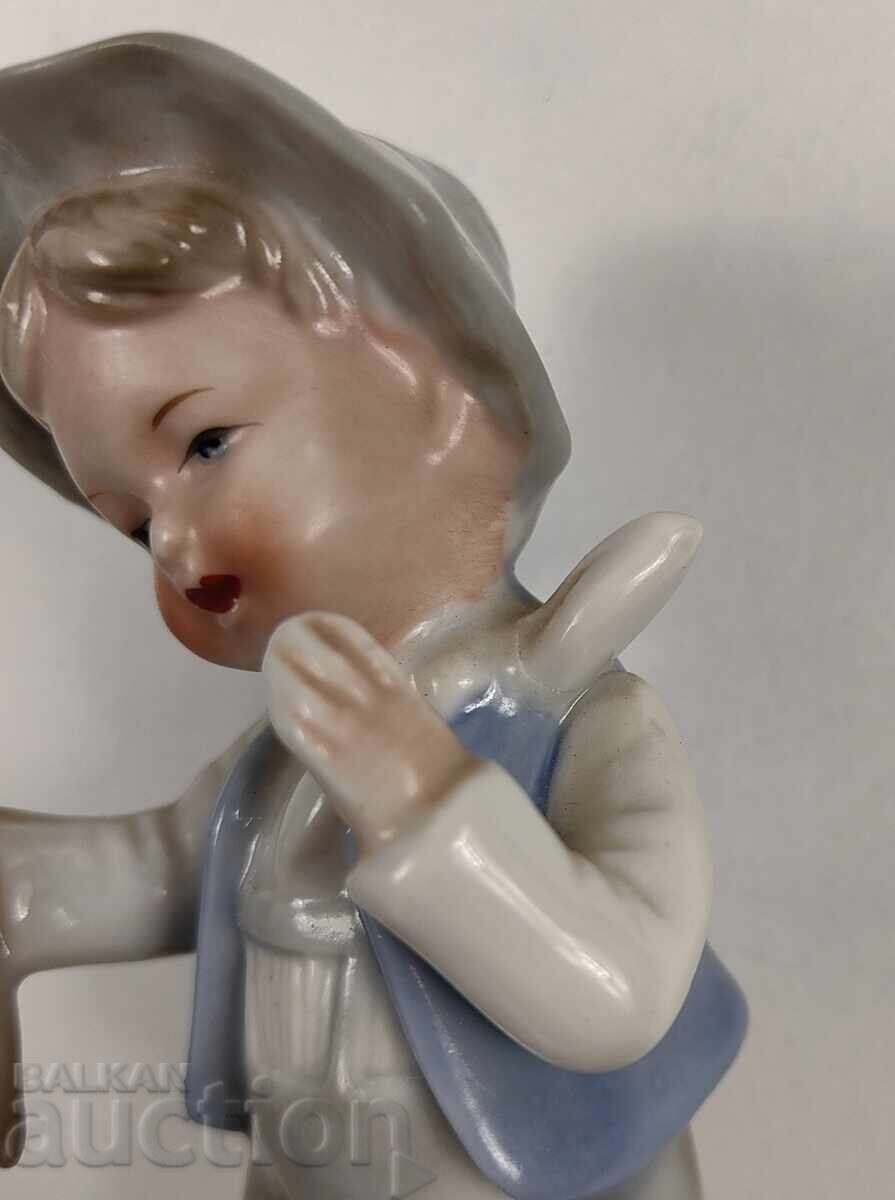 Auction PORCELAIN FIGURE BOY CARROT BUNNY STATUETTE Auction PORCELAIN FIGURE BOY CARROT BUNNY STATUETTE