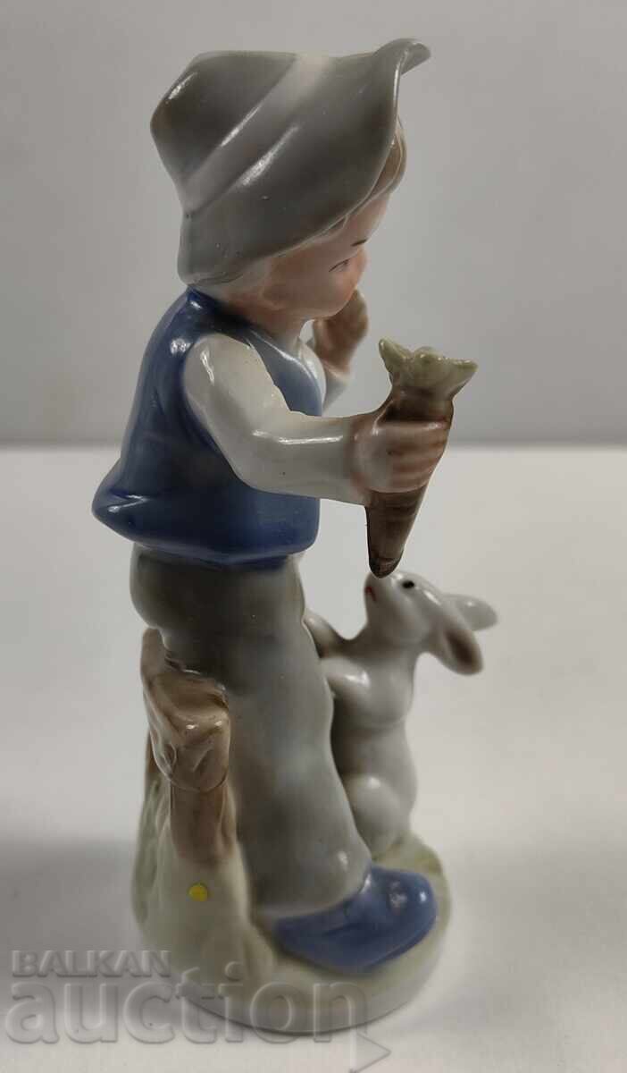 Delivery of PORCELAIN FIGURE BOY CARROT BUNNY STATUETTE Delivery of PORCELAIN FIGURE BOY CARROT BUNNY STATUETTE