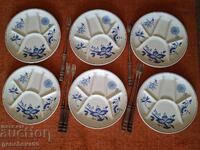 Set of blue onion plates and fondue forks