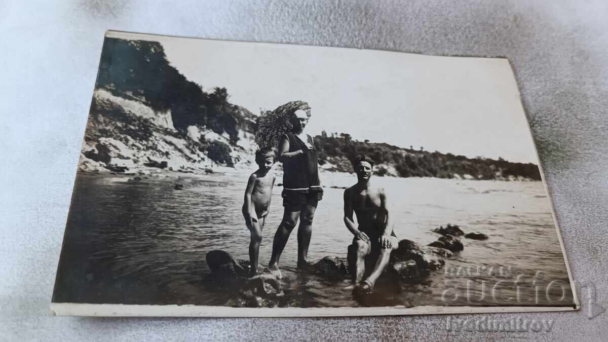 Varna Sisters Man, woman and little boy on stones in the sea 1928 Varna Sisters Man, woman and little boy on stones in the sea 1928