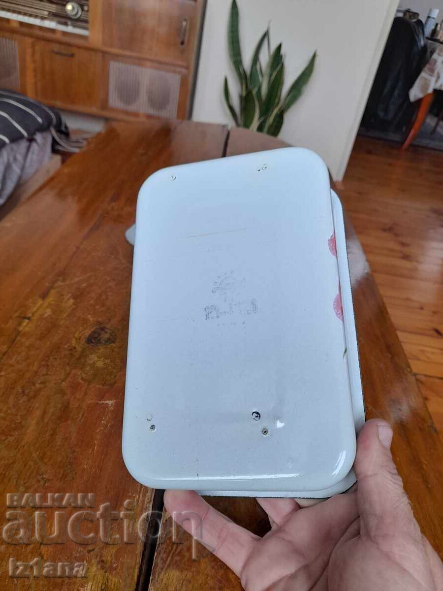 Delivery of Old enamel food box