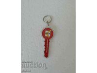 Keychain in the shape of a key