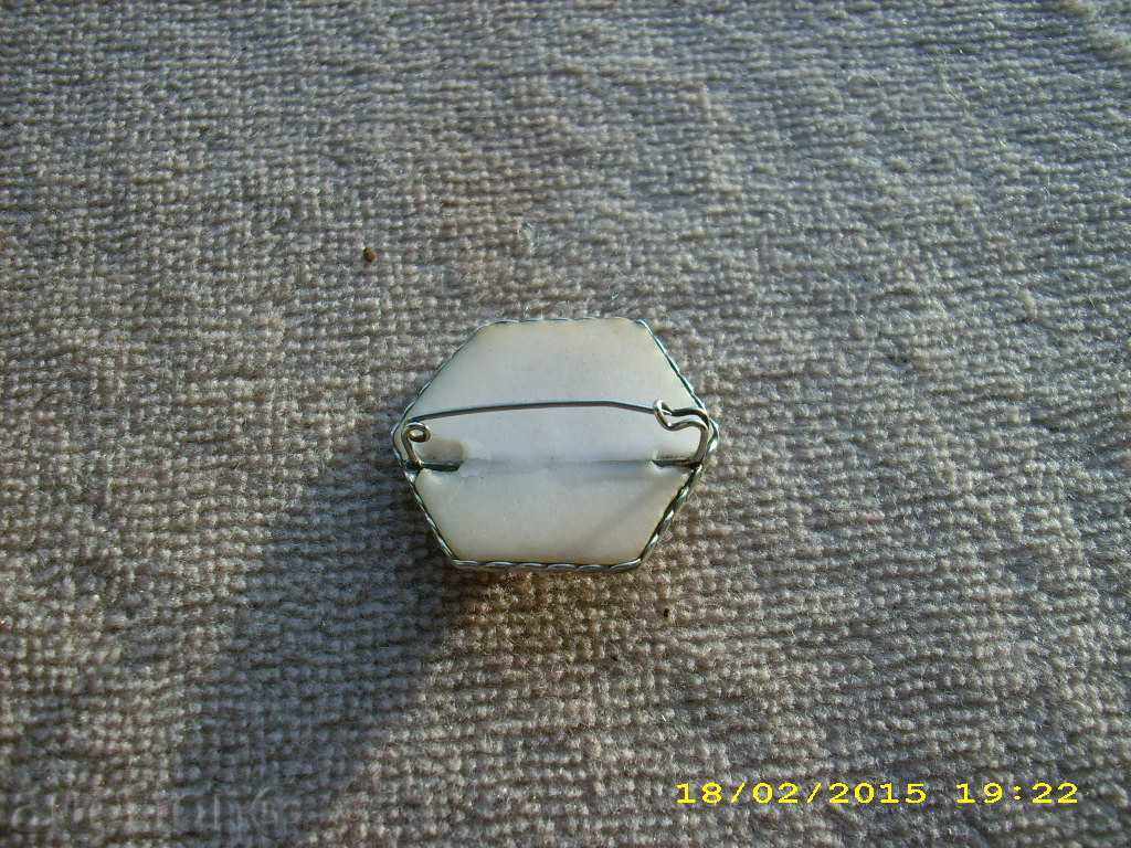 Delivery of Old brooch