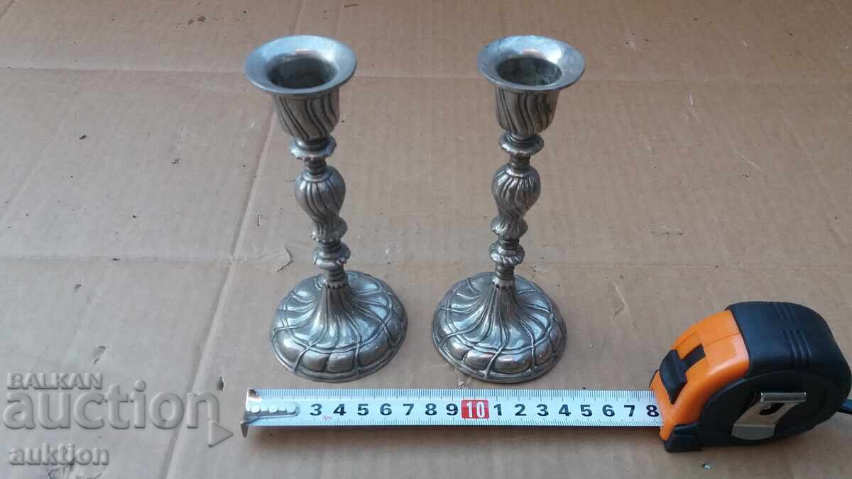Auction SET OF TWO SOLID SILVER-PLATED CANDLEHOLDERS Auction SET OF TWO SOLID SILVER-PLATED CANDLEHOLDERS