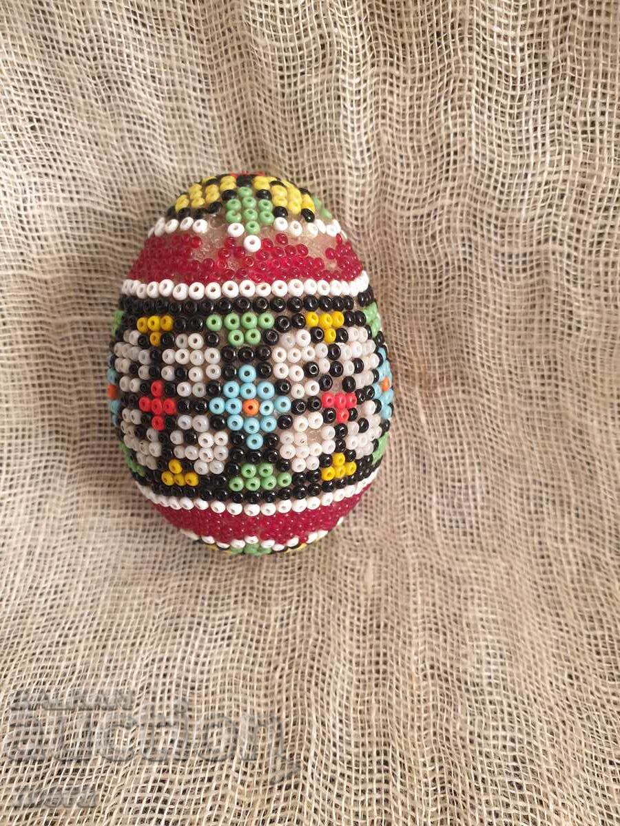 Decorative egg covered with colorful beads with price 20.00 BGN | € 10.23 Decorative egg covered with colorful beads with price 20.00 BGN | € 10.23