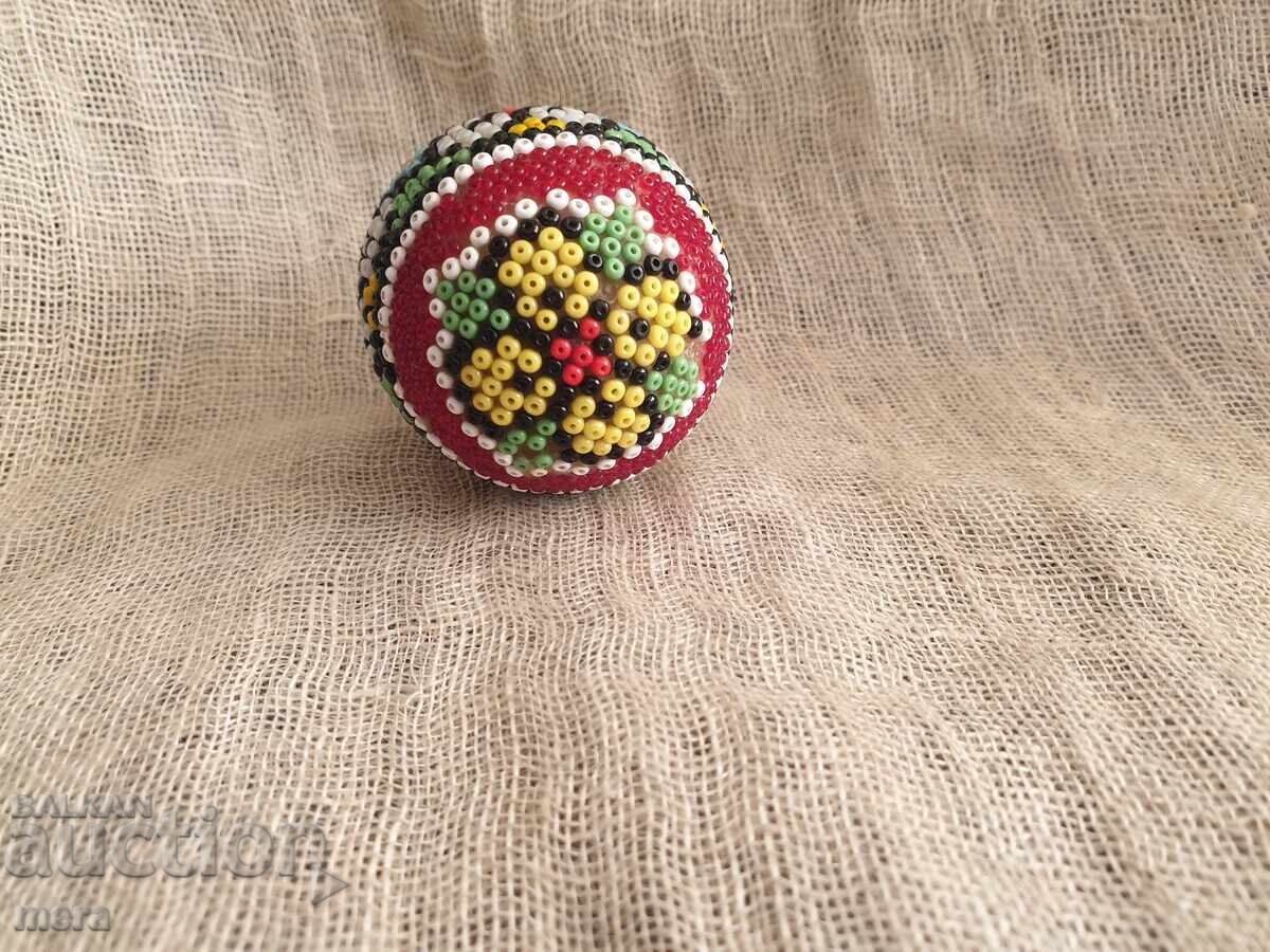 Delivery of Decorative egg covered with colorful beads Delivery of Decorative egg covered with colorful beads