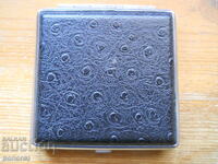 Old leather-lined cigarette case