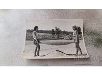 Photo Dimitrovgrad Two young girls sifting sand 1949