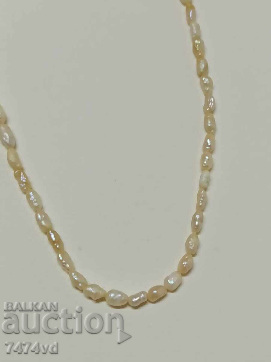 Old pearl necklace with natural beautiful small pearls with price 50.00 BGN | € 25.56 Old pearl necklace with natural beautiful small pearls with price 50.00 BGN | € 25.56