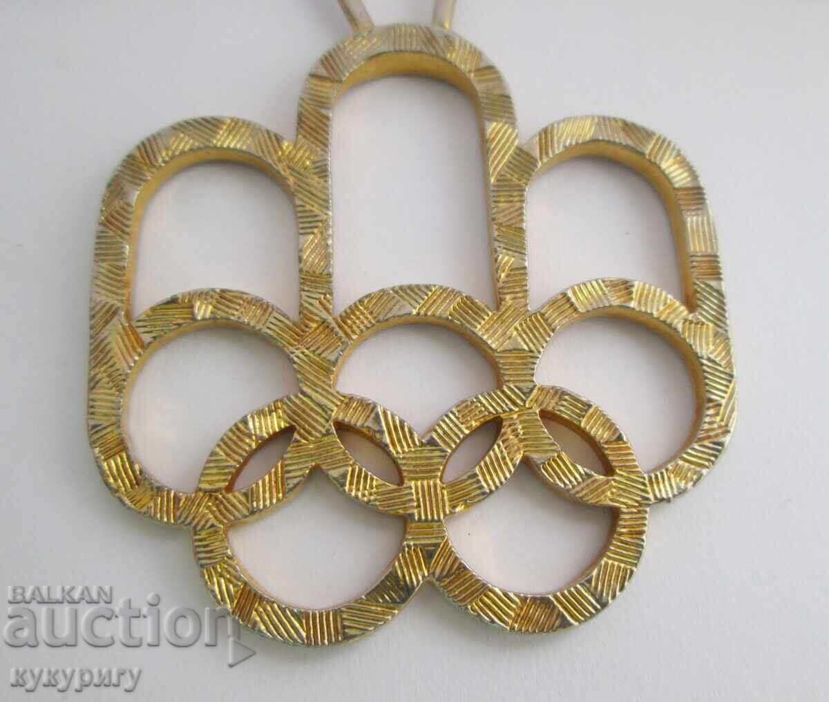 Auction Old Olympic necklace with the Montreal 1976 Olympics sign Auction Old Olympic necklace with the Montreal 1976 Olympics sign