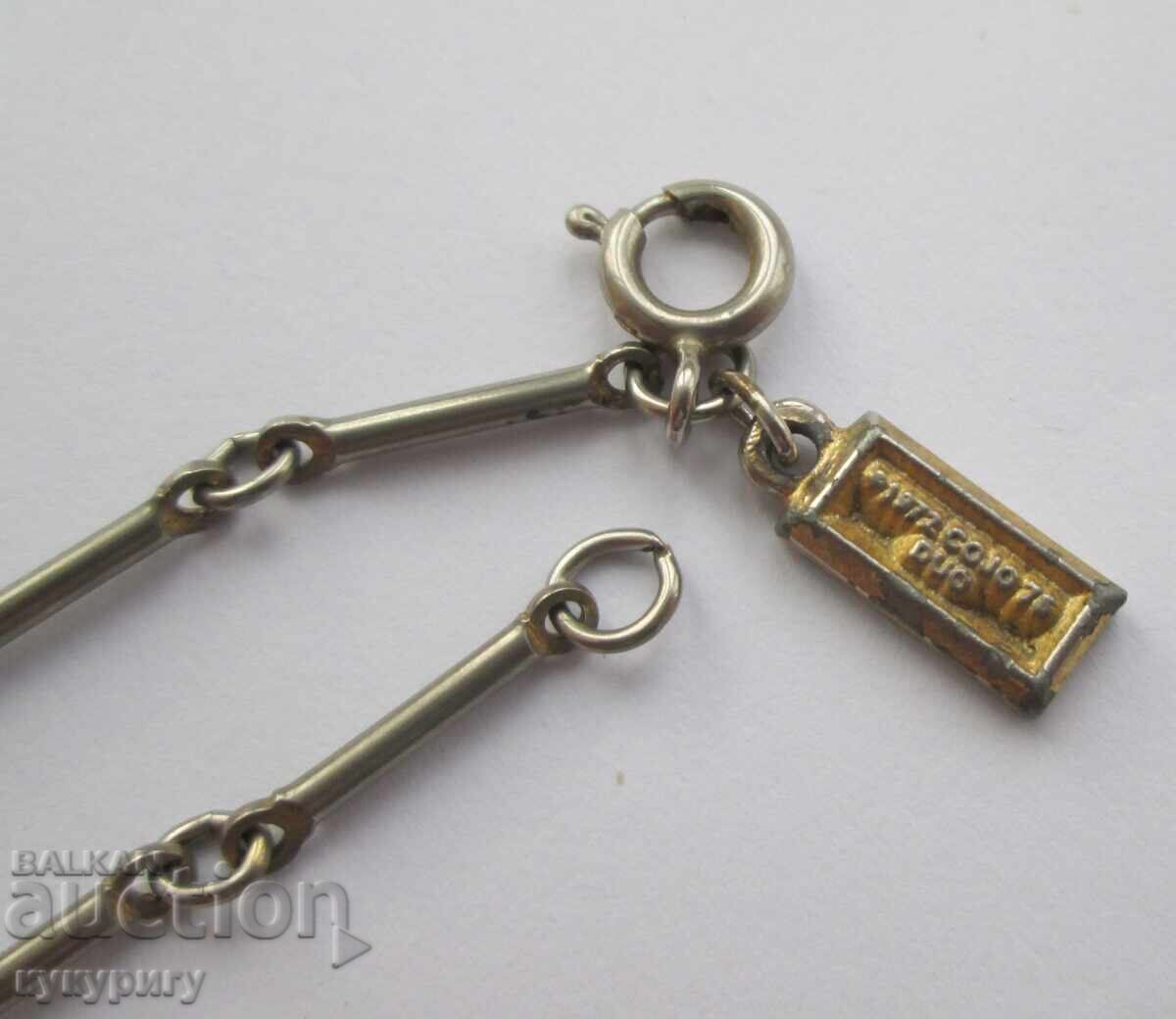 Delivery of Old Olympic necklace with the Montreal 1976 Olympics sign Delivery of Old Olympic necklace with the Montreal 1976 Olympics sign