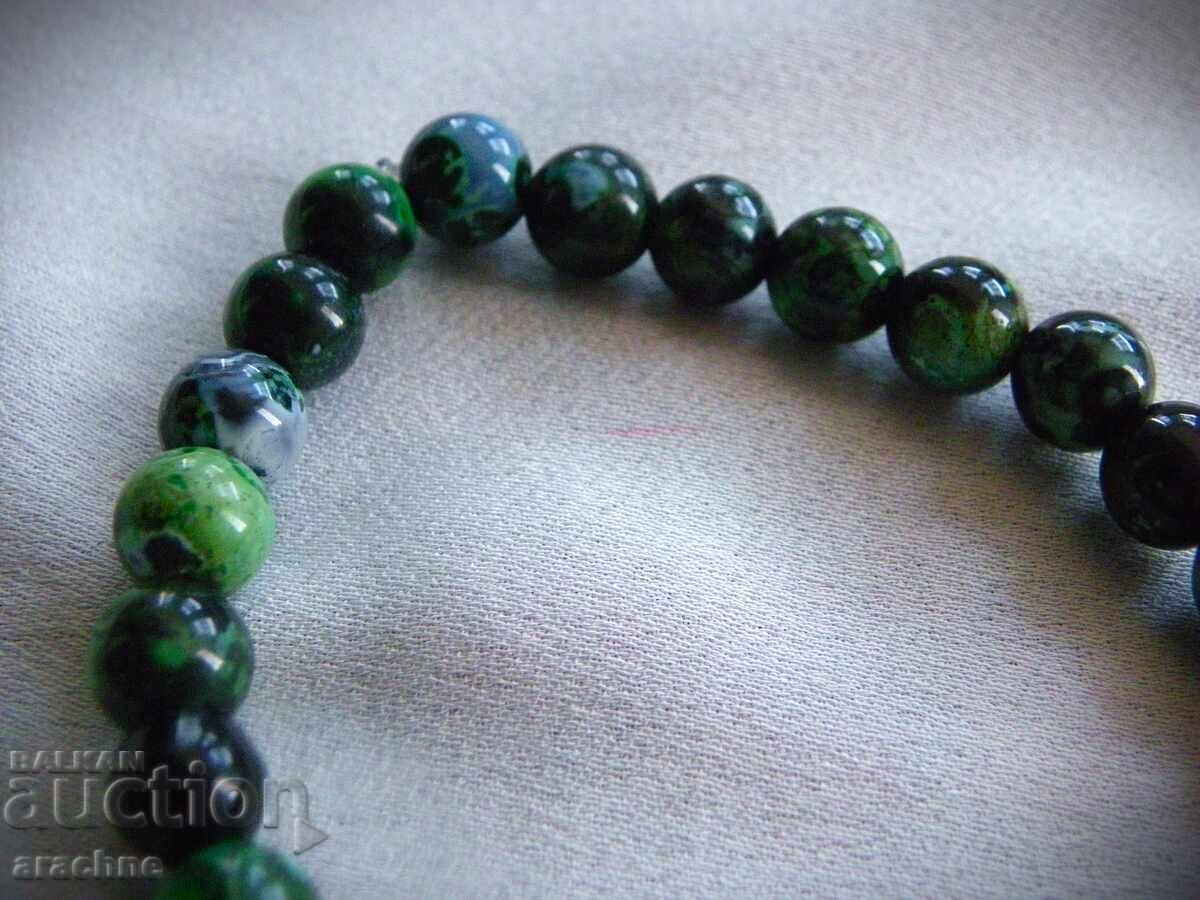 Аукцион Гривна от разноцветен саянски нефрит, Русия