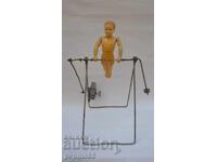 Old Russian mechanical toy gymnast