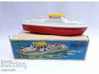 Old plastic toy boat/launch