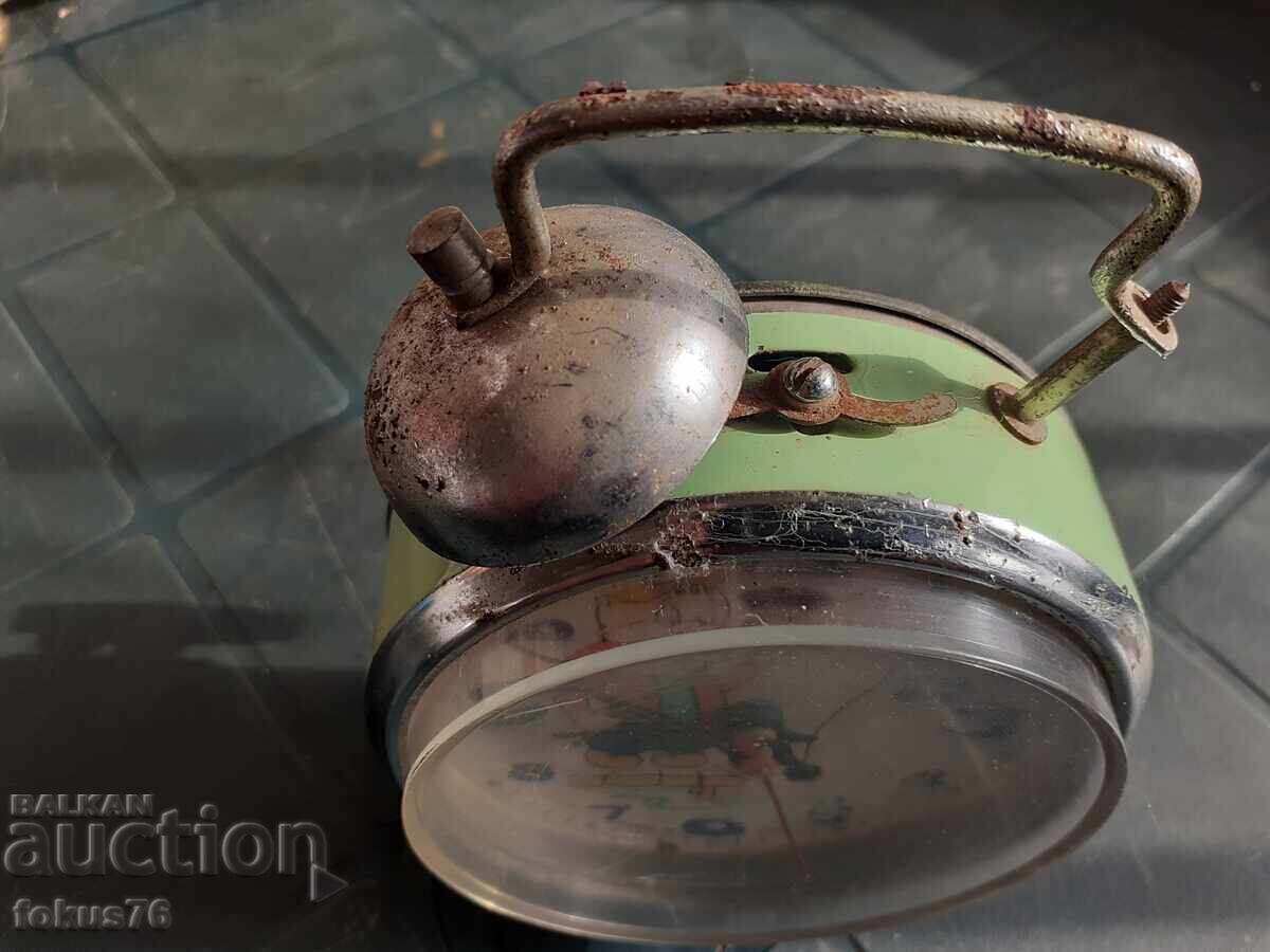 Delivery of Old animated Chinese alarm clock Delivery of Old animated Chinese alarm clock