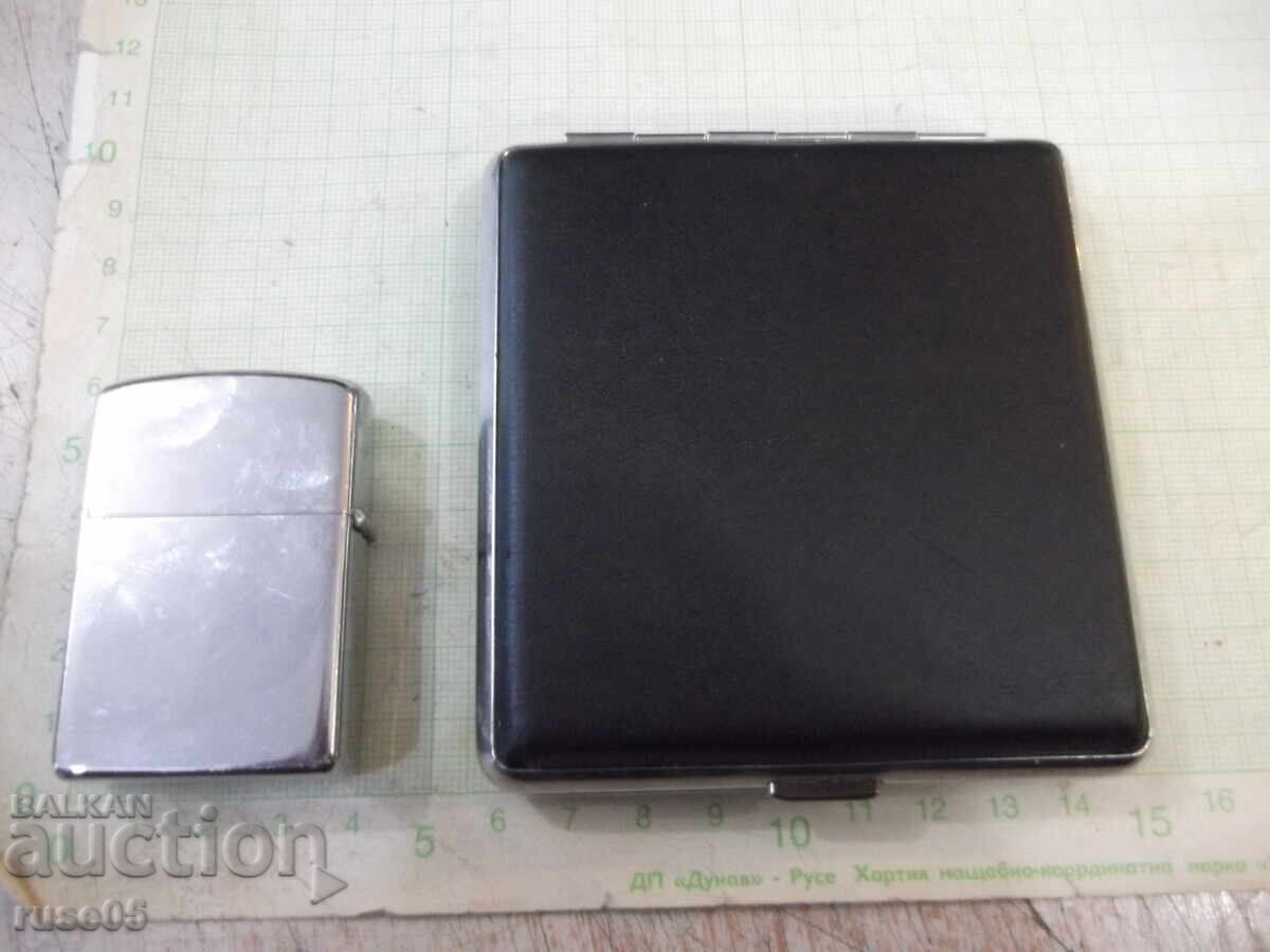 Delivery of "Jack Daniels" set - lighter and cigarette case Delivery of "Jack Daniels" set - lighter and cigarette case