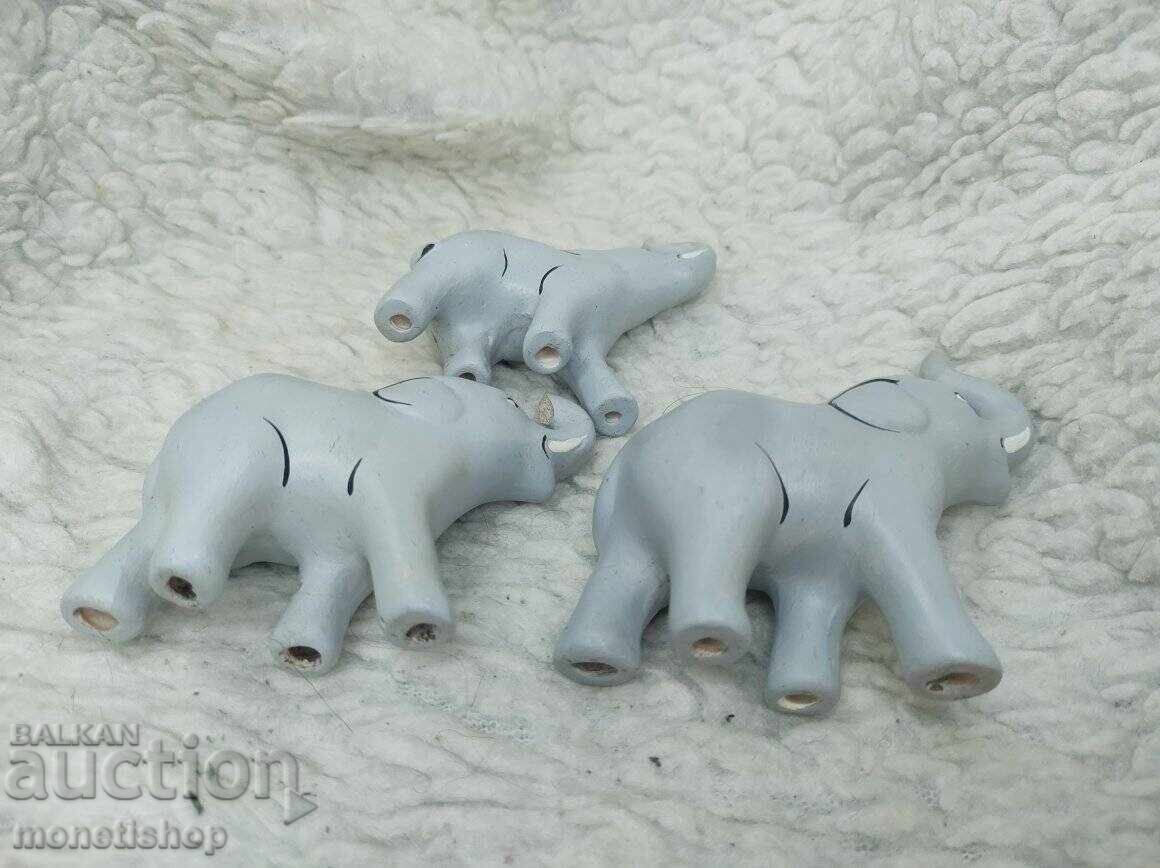 Auction Three porcelain elephants Auction Three porcelain elephants