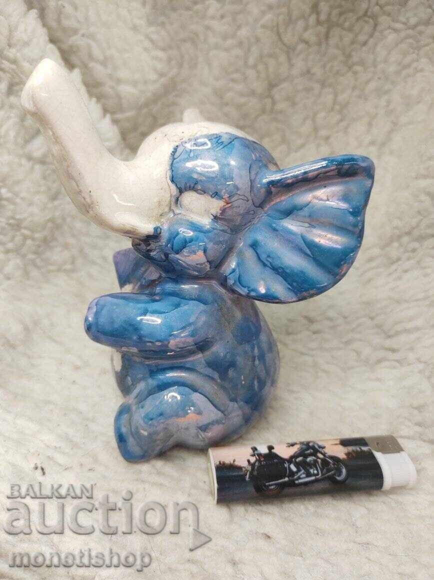 Δημοπρασία Πορσελάνινο ειδώλιο ενός ελέφαντα που χορεύει Δημοπρασία Πορσελάνινο ειδώλιο ενός ελέφαντα που χορεύει