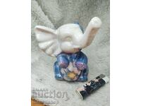 Porcelain figurine of a dancing elephant