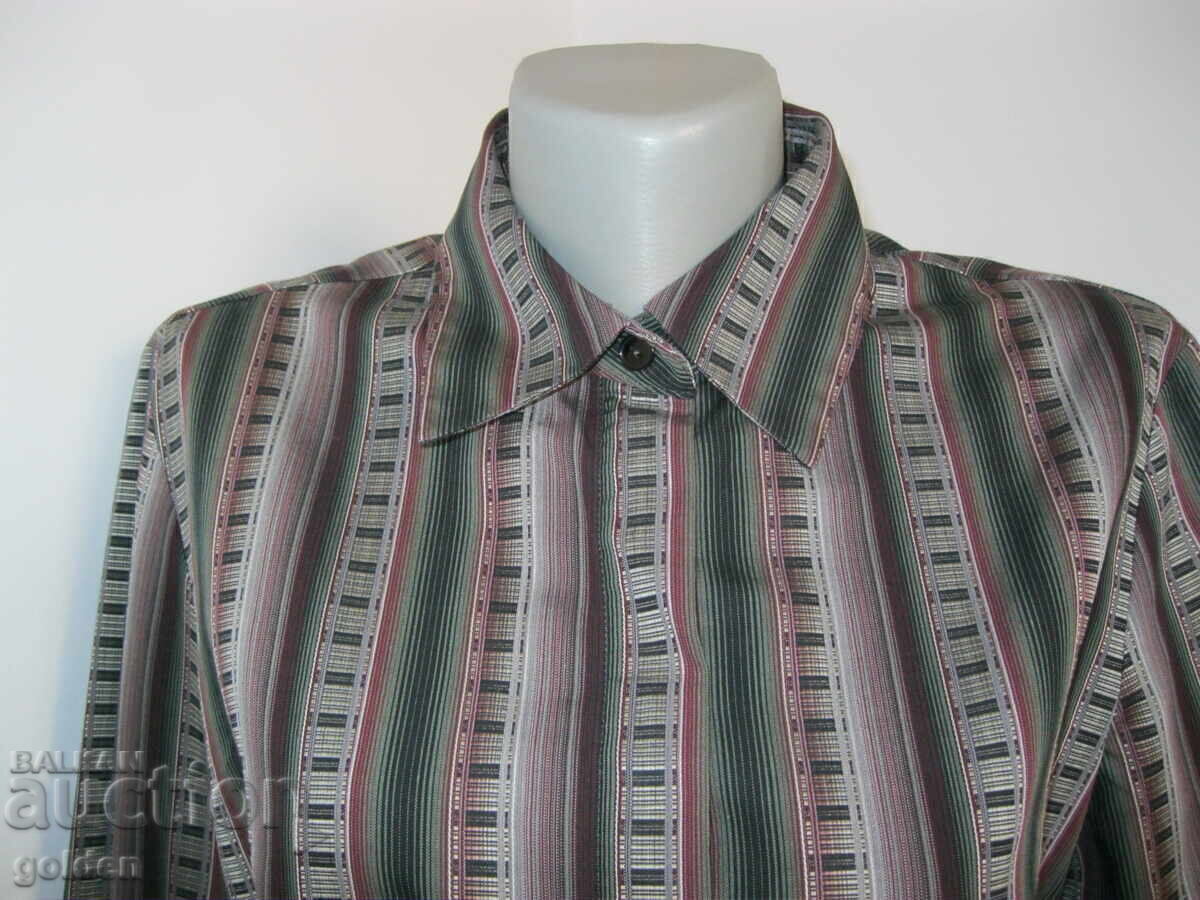 Е л е га н т н а  дамска  риза с цена € 9.90 | 19.36 лв.