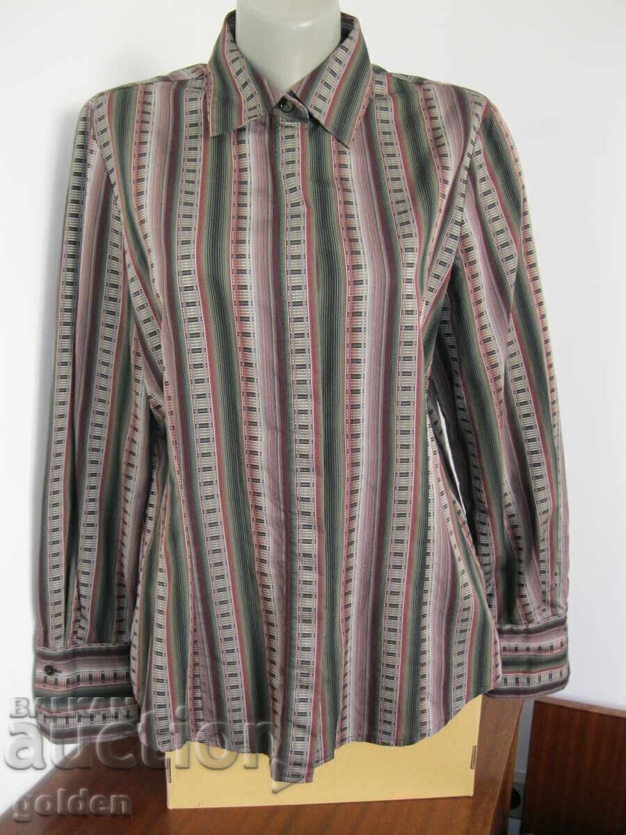 Κομψό γυναικείο πουκάμισο Κομψό γυναικείο πουκάμισο